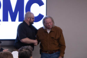 Jake Allred shakes hands with Fred King during an event at Eastern Idaho Regional Medical Center on Monday. | Cody Roberts, EastIdahoNews.com