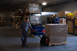 A pallet of food is taken into the warehouse of the Community Food Basket Tuesday. | Cody Roberts, EastIdahoNews.com