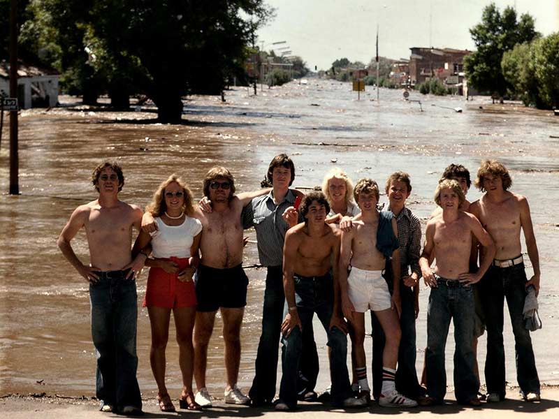 Brian Gibson, left, and Brent Gibson, center, crouching down, are brothers. They share their memories of the story behind this photo and the plan to reunite with the group this summer. | Courtesy Brent Gibson