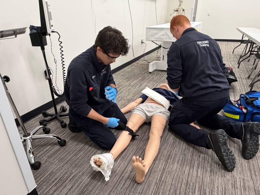Gage and Isaac working on patient