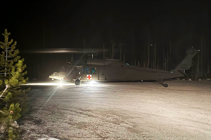 A helicopter joined the search and rescue efforts for a man trapped under logs on Marsh Creek on Tuesday night. | Custer County Sheriff's Office