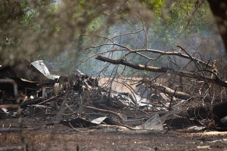 A fire smolders near the Thornton Merc on Thursday. | Cody Roberts, EastIdahoNews.com