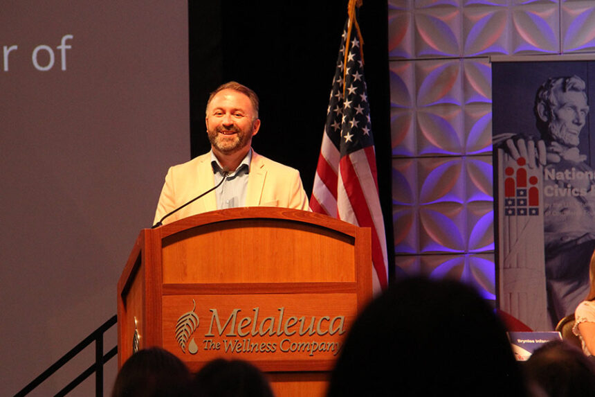 Paul Baker delivers his opening remarks.