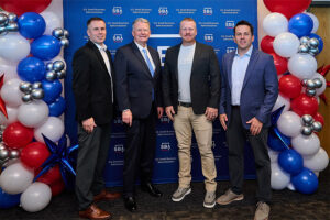Scott Jolley, Idaho Gov. Brad Little, Dallin Jolley and Morgan Jolley pose for a photo. | Courtesy Photo