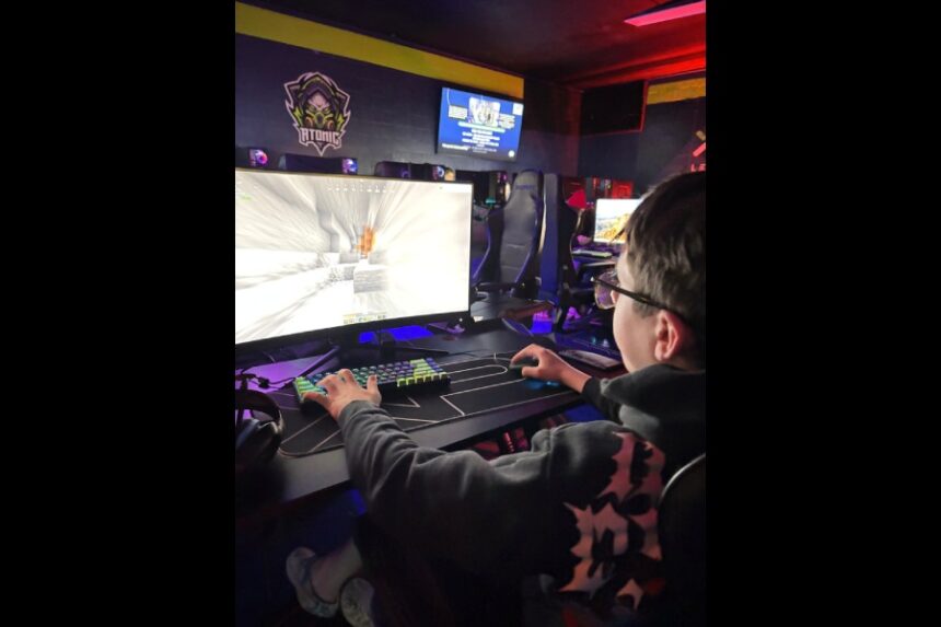 A young boy is playing Minecraft on a computer screen. | Courtesy photo