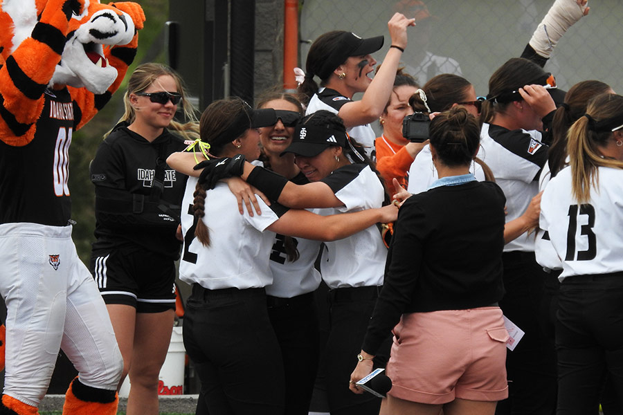 ISU softball Ava Brown, Alyssa Yee and Camryn McDonald share an embrace during their Big Sky Tournament championship victory