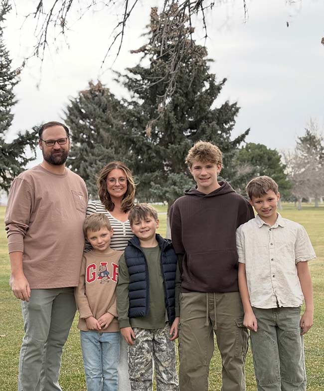 Krista Butler, second from left, with her husband, and four boys. | Courtesy Krista Butler