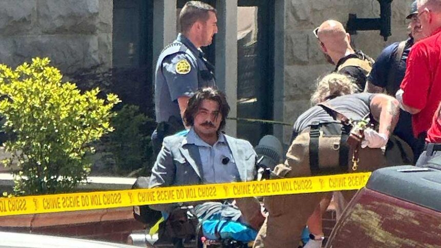 Dalton Eatherly is seen on a stretcher after an incident outside the Montgomery County Courthouse in Clarksville, Tennessee, on May 13.