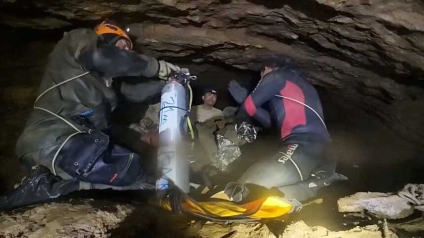 Divers from an international rescue team show the trapped villagers how to use diving equipment in Xaisomboun Province, Laos, in this screengrab obtained from a social media video released on Saturday, May 30, 2026.