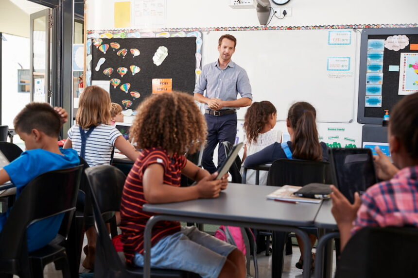Elementary school students and teacher in classroom