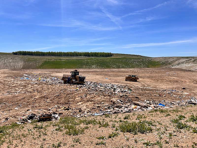 People at work inside the Newdale landfill Tuesday afternoon. | Rett Nelson, EastIdahoNews.com