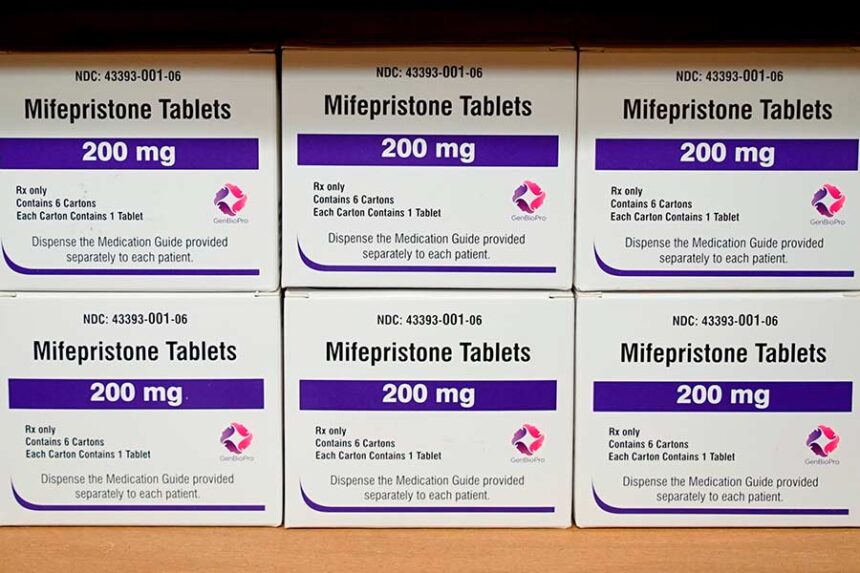 FILE - Boxes of the drug mifepristone sit on a shelf at the West Alabama Women's Center in Tuscaloosa, Ala., March 16, 2022. (AP Photo/Allen G. Breed, File)