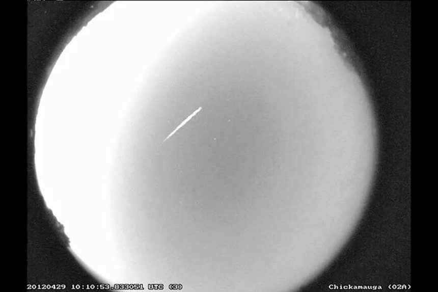 FILE - This photo provided by NASA shows an Eta Aquarid meteor streaking over northern Georgia on April 29, 2012. (B. Cooke/Marshall Space Flight Center/NASA via AP, File)