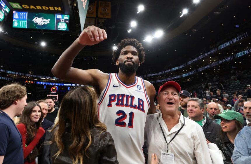 Philadelphia 76ers' Joel Embiid celebrates following his team's victory over the Boston Celtics after the Game 7 in a first-round NBA basketball playoffs series, Saturday, May 2, 2026 in Boston. (AP Photo/Jim Davis)