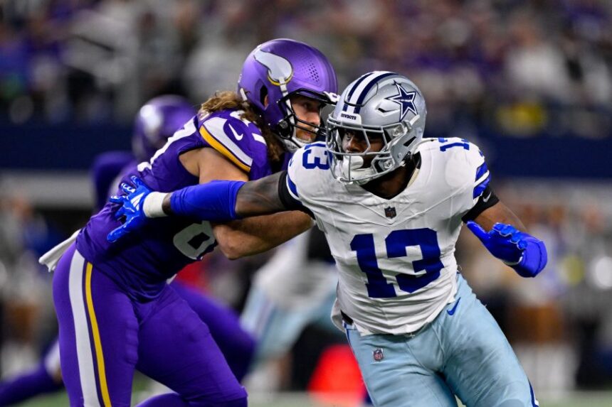 FILE - Dallas Cowboys defensive end Dante Fowler Jr. (13) rushes the line past Minnesota Vikings tight end T.J. Hockenson (87) during an NFL football game between the Dallas Cowboys and the Minnesota Vikings on Dec. 14, 2025, in Arlington, Texas. (AP Photo/Jerome Miron, File)