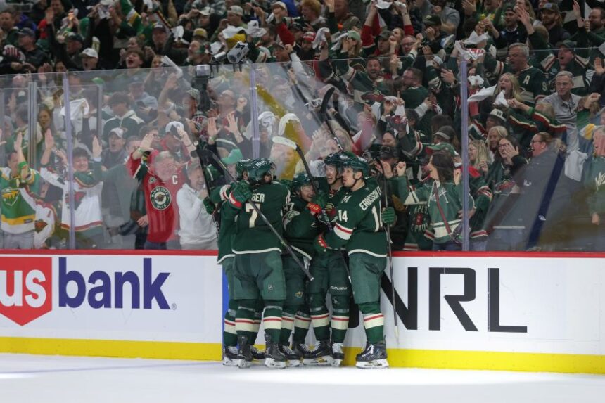 Minnesota Wild left wing Matt Boldy, second from the right, celebrates with teammates after scoring during the third period of Game 6 in the first round of the NHL hockey Stanley Cup playoff series against the Dallas Stars, Thursday, April 30, 2026, in St. Paul, Minn. (AP Photo/Bailey Hillesheim)