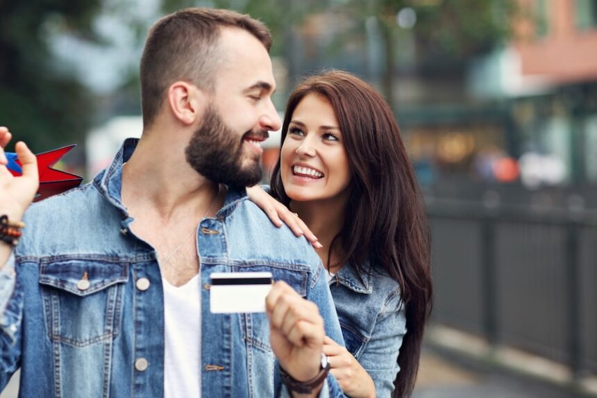 portrait of happy couple with shopping bags after 2026 03 16 06 18 36 utc