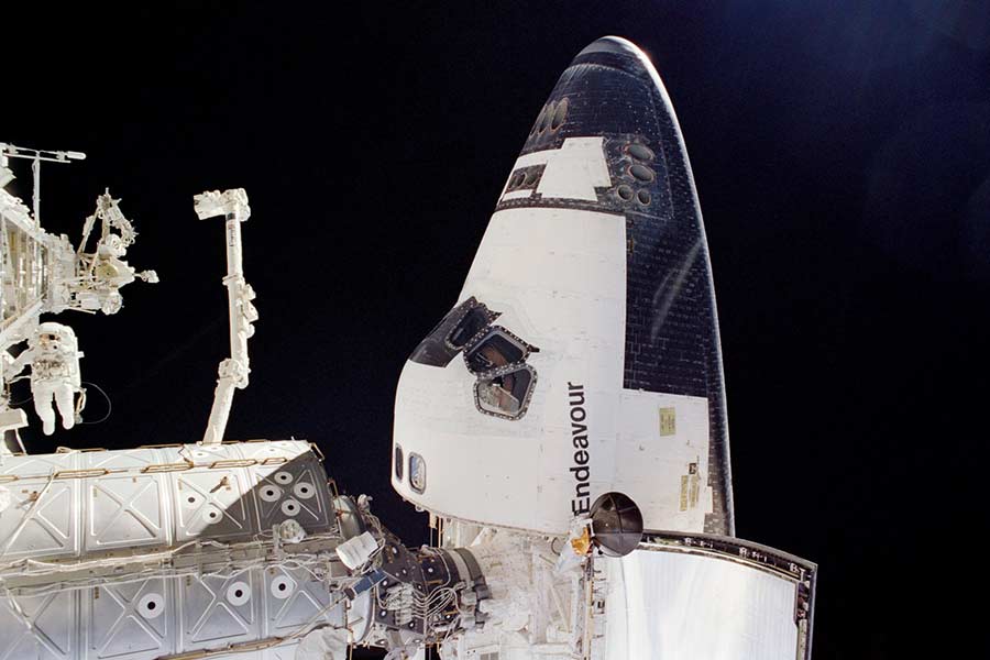Herrington outside the USS Endeavor during a spacewalk in 2002. | Courtesy John Herrington