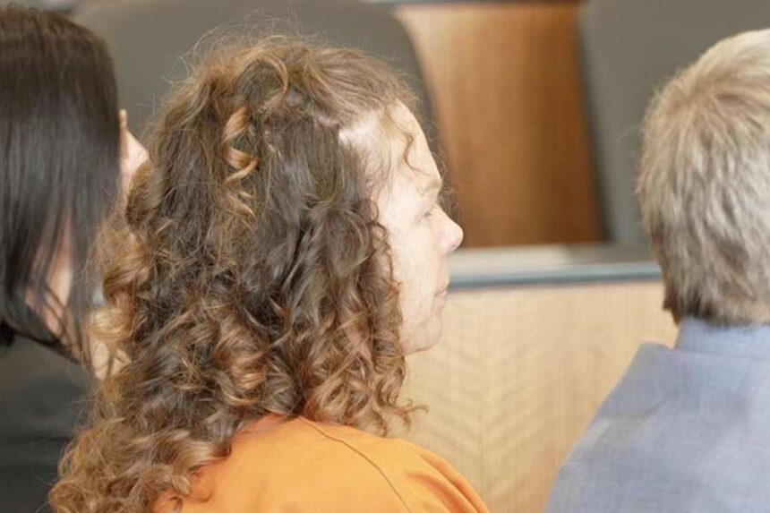 Meggan Sundwall sits with her attorneys at her sentencing on Monday. She was convicted of helping her friend die of an insulin overdose and was ordered to serve a term of one to 15 years in prison for manslaughter. (Paola Montenegro)