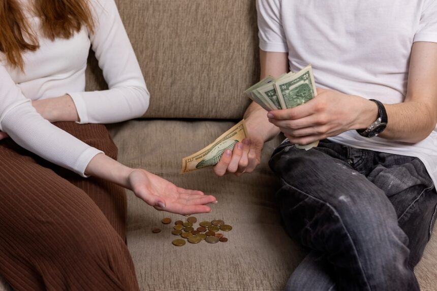 young man giving money to young woman indoors 2026 03 15 23 29 17 utc