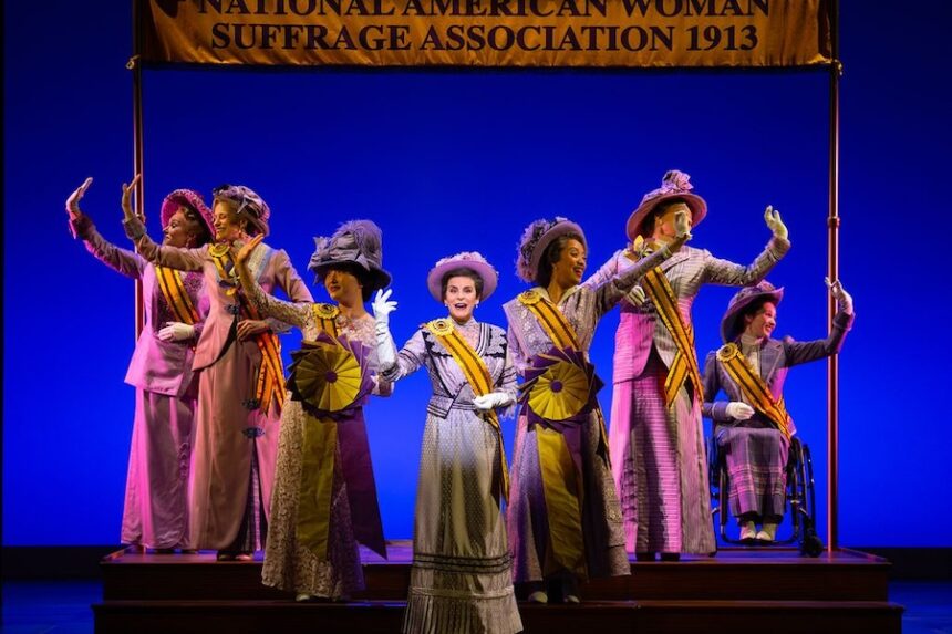 1 jenn colella as carrie chapman catt and suffs company