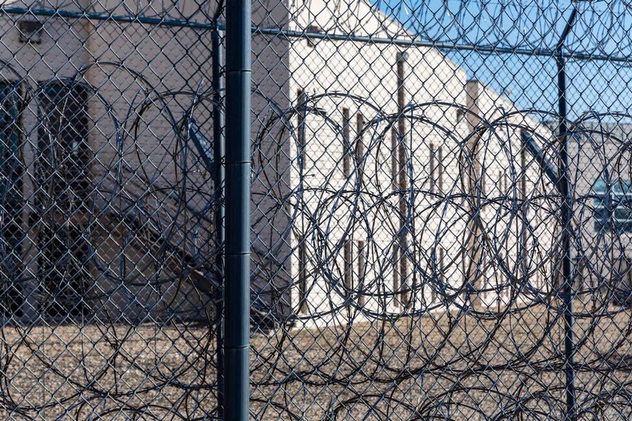 Razor wire fencing surrounds the Idaho Department of Correction’s Idaho Maximum Security Institution. The prison facility is located south of Boise in a sparsely developed part of the nearby city of Kuna. | Sarah A. Miller, ProPublica