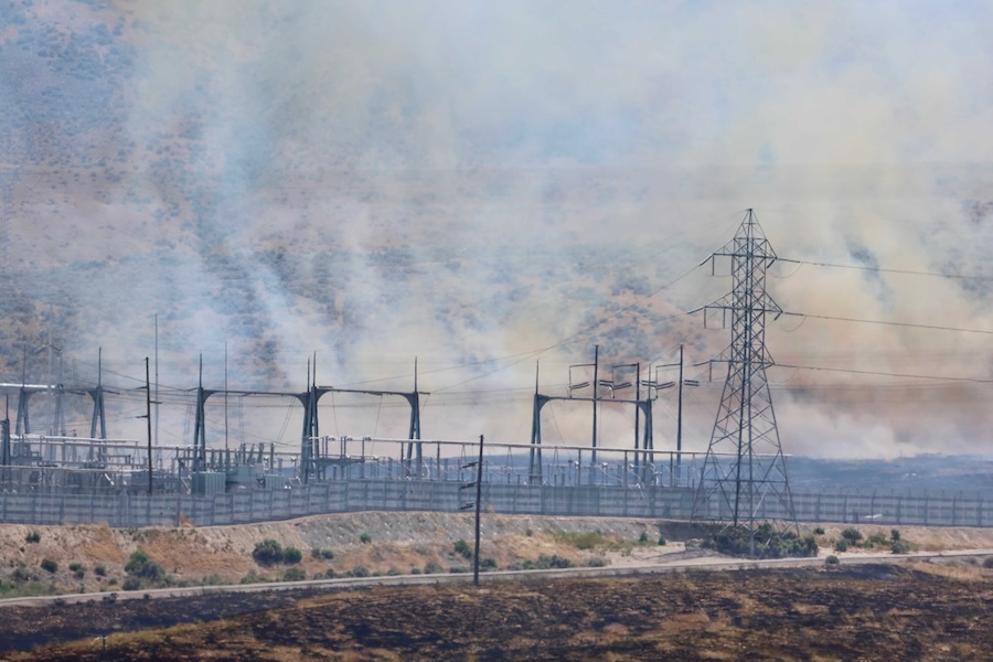 The Michaud Creek Fire burns on the Fort Hall Indian Reservation, south of Interstate 85 and about 10 miles west of Pocatello, on Saturday.
