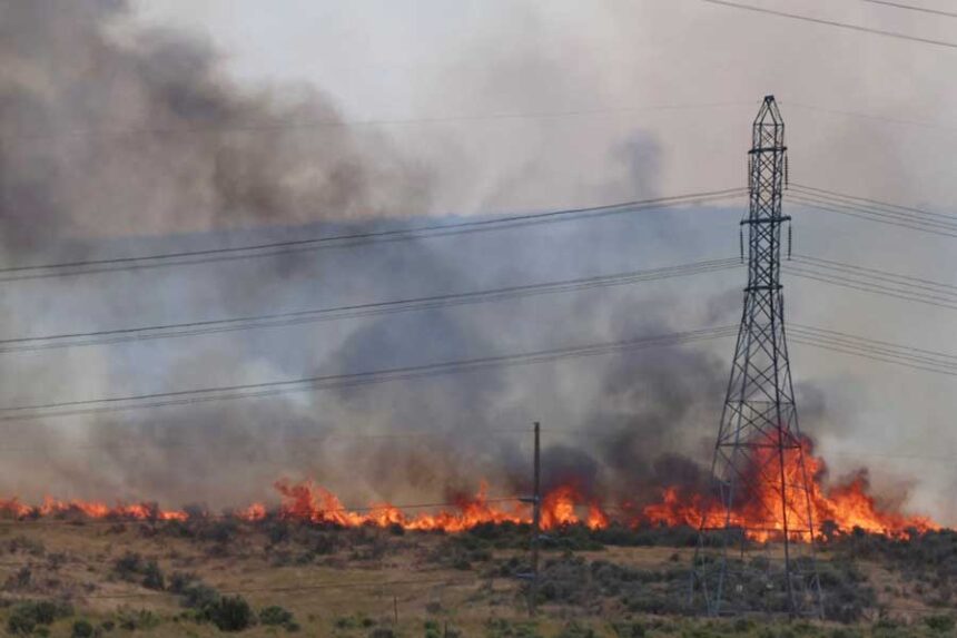 The Michaud Creek Fire burns on the Fort Hall Indian Reservation, south of Interstate 86 and about 10 miles west of Pocatello, on Saturday.