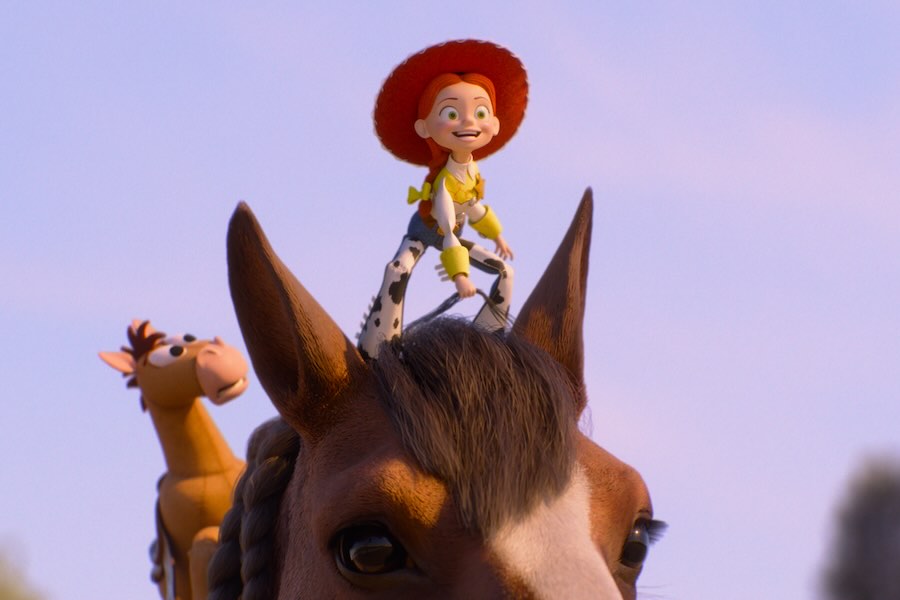 This image released by Pixar shows the characters Bullseye and Jessie, voiced by Joan Cusack, center, in a scene from "Toy Story 5."