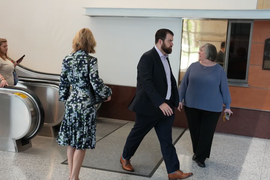 Colin Hortman, center, son of Melissa and Mark Hortman, walks inside the federal courthouse in Minneapolis on Thursday, June 11, 2026.
