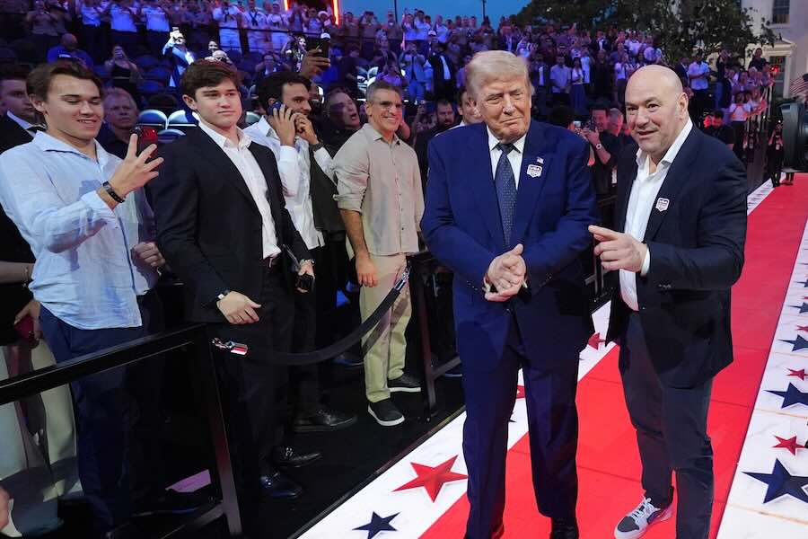 President Donald Trump and Dana White, UFC president and CEO, arrive for UFC Freedom 250 on the South Lawn of the White House, Sunday, June 14, 2026, in Washington.