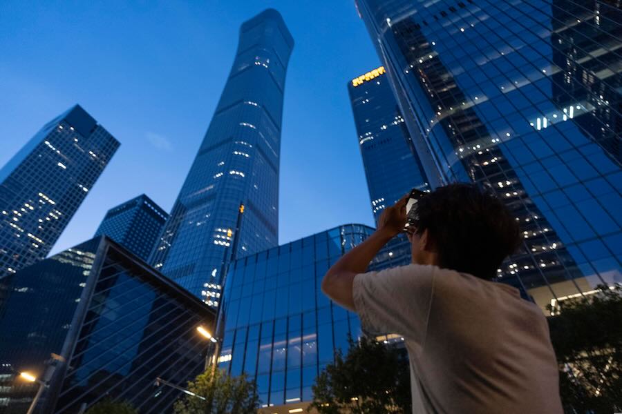 Small aircraft crashes into Beijing's tallest building, according to flight tracking service