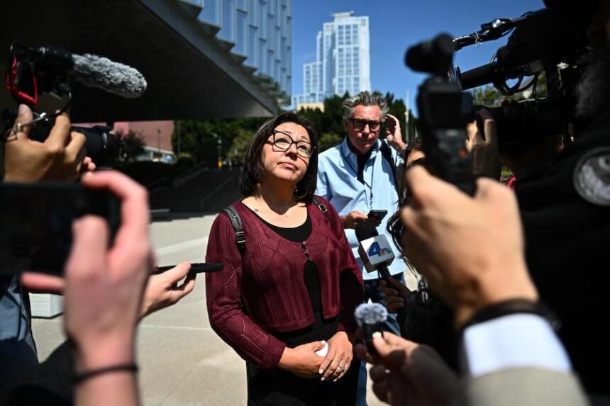 Syrena, a member of the jury speaks outside federal court after a federal judge declared a mistrial in the arson case against the man accused of sparking the deadly 2025 Palisades Fire, Friday June 26, 2026, in Los Angeles.