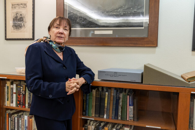 Idaho State Historical Society Executive Director Janet Gallimore reflects on her agency’s mission in the Lincoln Reading Room, where members of the public can access historical records. (Photo by Kyle Pfannenstiel/Idaho Capital Sun)