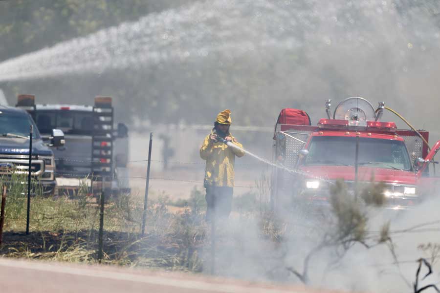 A wildfire burns near the 6000 Block of W. Old Highway 91 in Bannock County on Sunday, June 21, 2026.