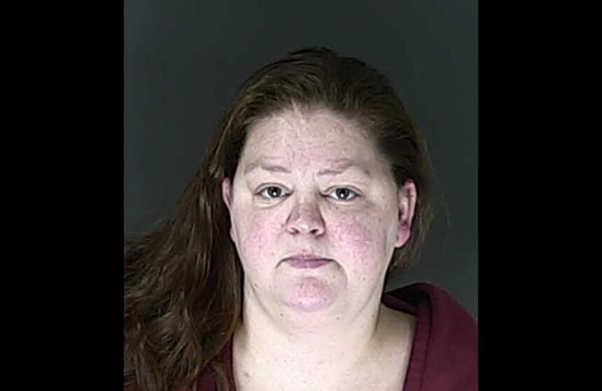 According to court records, Ashley Losey, who is accused of being a part of a long and bitter neighbor dispute, fed her neighbor's cat to her dogs. | El Paso County Sheriff's Office/KRDO via CNN Newsource