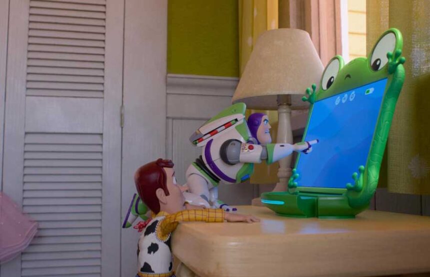 This image released by Pixar shows the characters Woody and Buzz, voiced by Tom Hanks and Tim Allen, interacting with a new character named Lilypad, voiced by Greta Lee, in a scene from "Toy Story 5."