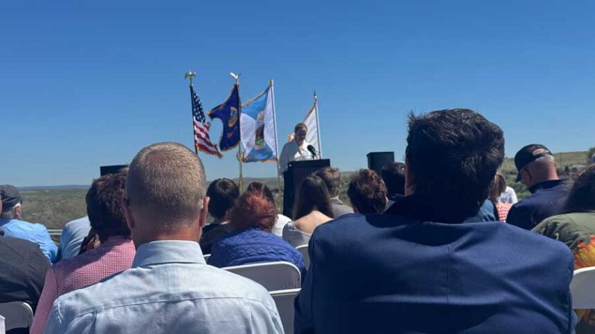 Federal, state and regional officials gather for a commemoration ceremony for the 50th anniversary of the Teton Dam disaster, at a site near the dam on Friday, June 5, 2026.