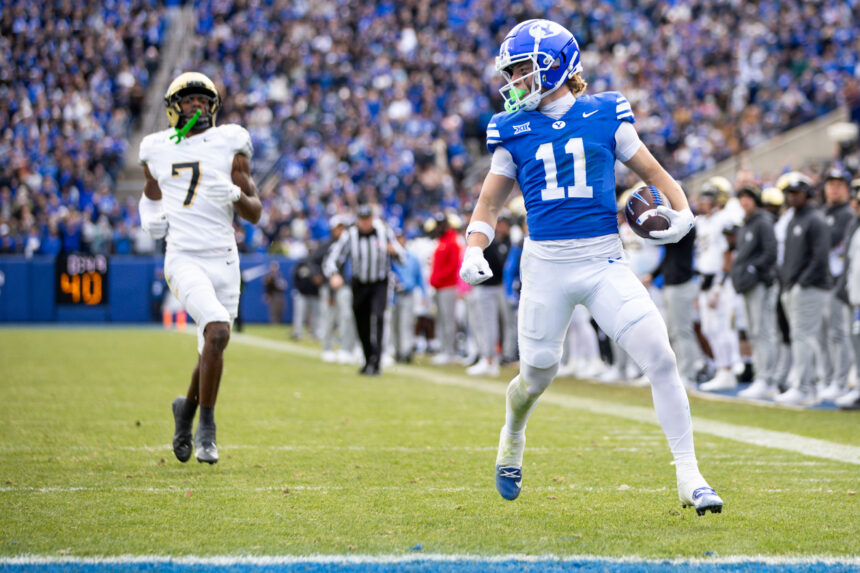 BYU wide receiver Parker Kingston (11) looks back as he scores a touchdown during the second half of the game against the UFC Knights at LaVell Edwards Stadium in Provo, Utah, on Nov. 29, 2025.