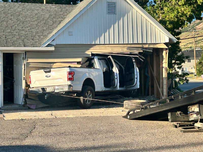 A pickup truck crashed into a house in Perry, Utah, on Thursday, June 11, 2026. The truck was involved in a crash on U.S. Highway 89, causing it to veer off the roadway and into the house, according to Box Elder County Sheriff's Office.