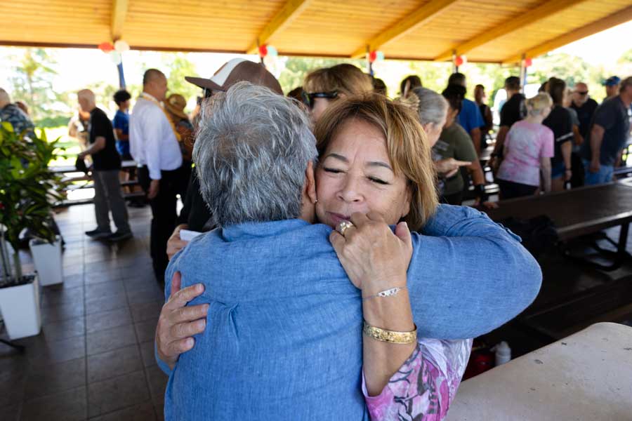 At a Church meetinghouse parking lot in Hilo, Hawaii, on June 13, 2026, nonprofit representatives, members, and friends of The Church of Jesus Christ of Latter-day Saints meet to organize a food donation from the Church as part of the America250 America Gives Initiative. Hawaii is the 50th state to receive a donation.