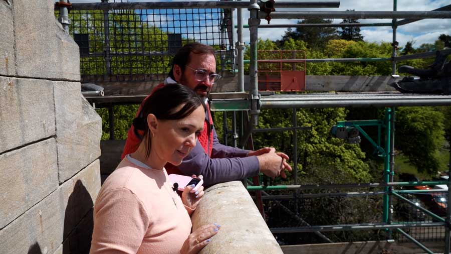 David and Chelom Leavitt take in the view from a balcony of their Scottish castle while giving a KSL news crew a tour of the building in 2026.
