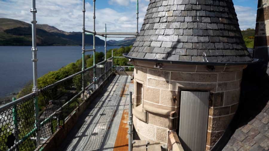 A close-up view of the exterior of a Utah couple's castle in Cove, Scotland, as it undergoes renovations in 2026.