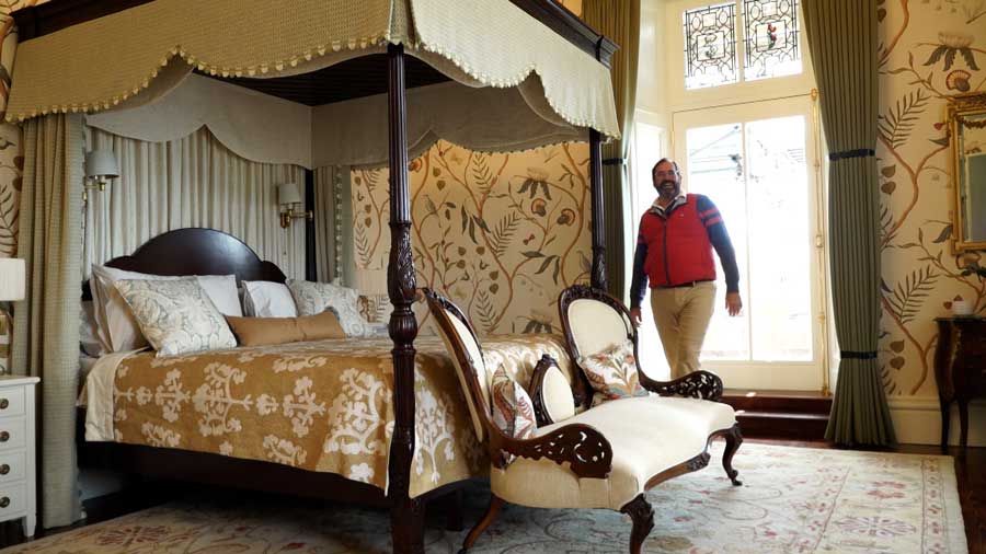 David Leavitt walks through a bedroom while giving a KSL news crew a tour of the Scottish castle he and his wife, Chelom, are renovating.