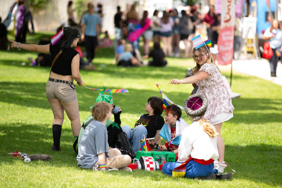 People sit in Centennial Park during Gate City Pride on Saturday. | Cody Roberts, EastIdahoNews.com
