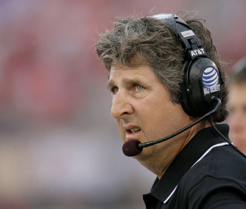 FILE - Texas Tech head coach Mike Leach looks at the scoreboard during the first quarter of a football game against SMU, Sept. 3, 2007, in Dallas. (AP Photo/Matt Slocum, file)