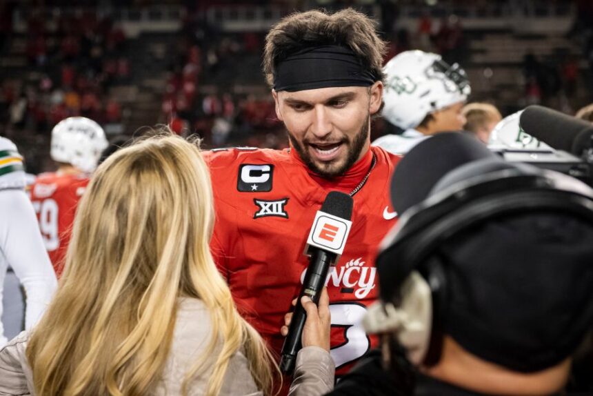 FILE - Cincinnati quarterback Brendan Sorsby (2) is interviewed after a NCAA college football game against Baylor, Oct. 25, 2025, in Cincinnati. (AP Photo/Tanner Pearson, File)