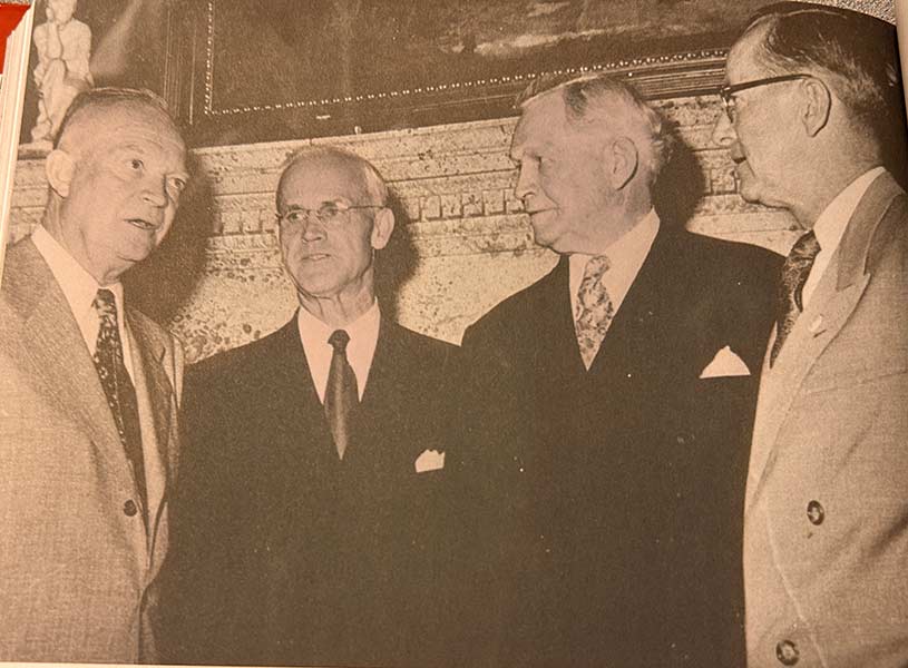 President Eisenhower, left, having a discussion with three Latter-day Saint leaders: U.S. Senator Arthur Watkins, R-Utah, former church president David O. McKay, and Ezra Taft Benson. | Photo taken from the book, "Presidents and Prophets" by Mike Winder