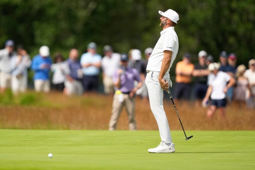 Dustin Johnson reacts after missing a putt during the second round of the U.S. Open golf tournament at Shinnecock Hills Golf Club in Southampton, N.Y., Friday, June 19, 2026.(AP Photo/Gerald Herbert)