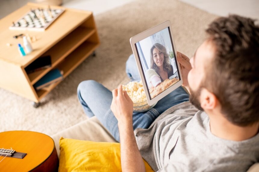 man video calling with woman while eating popcorn 2026 03 24 13 04 45 utc